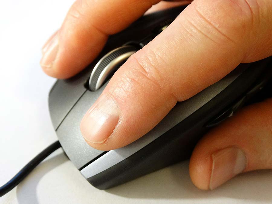 hand on mouse ready to click